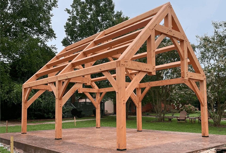 Wooden frame structure in a garden setting