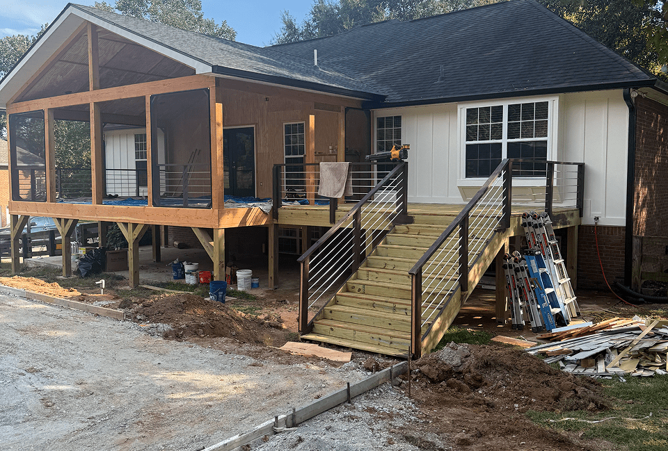 Building extension featuring wooden stairs and rails