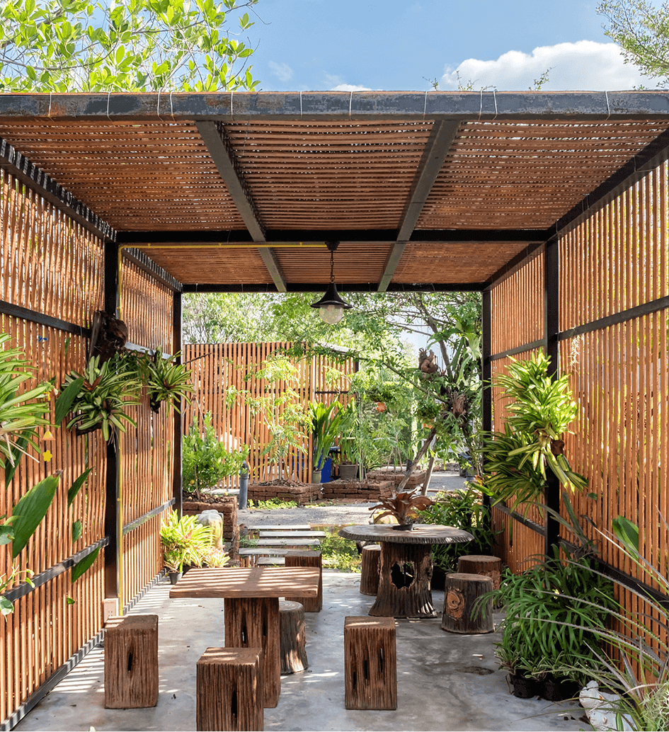 Rustic garden seating area with greenery